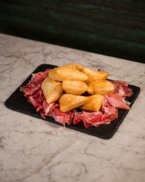 Fried dough and raw ham